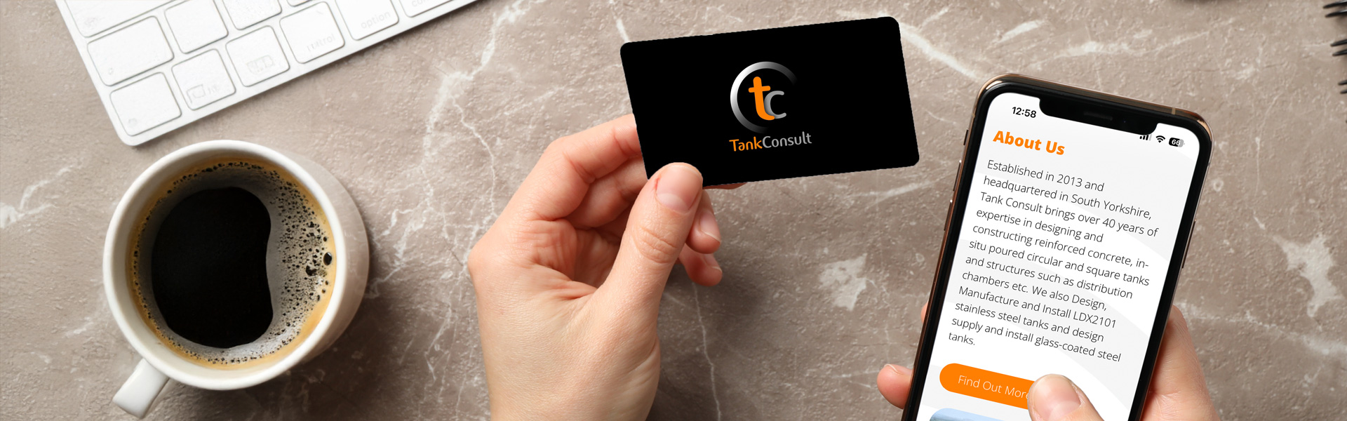 Hands holding Tank Consult’s new digital business card and viewing the Tank Consult website on a smartphone, highlighting the company’s carbon‑reducing switch to digital contact details.